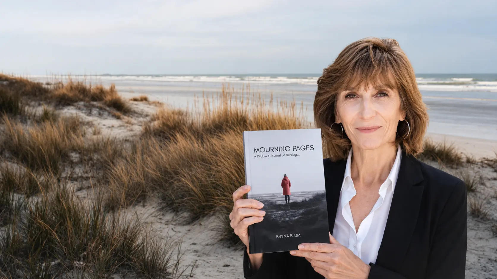 Author, Bryna Blum holding her book